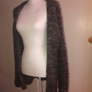 Fuzzy cardigan sweater with pink accent